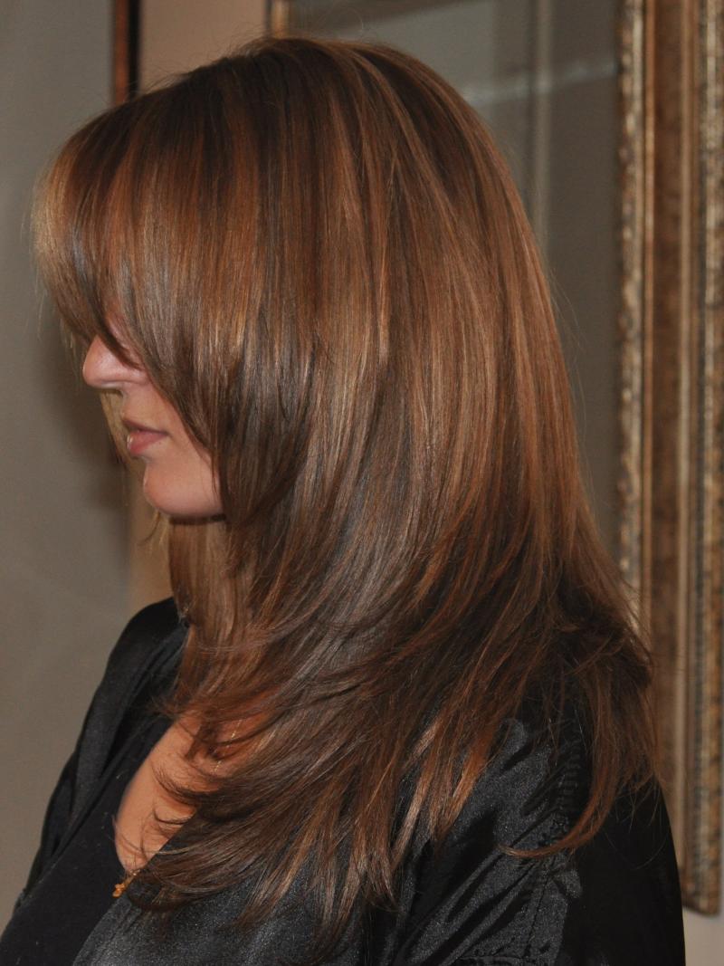 Layered brunette hairstyle photographed at Manuel Salon